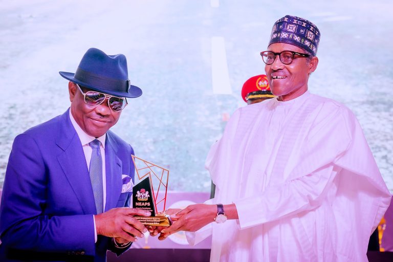 Pictorial: Buhari honours Wike, others with service award